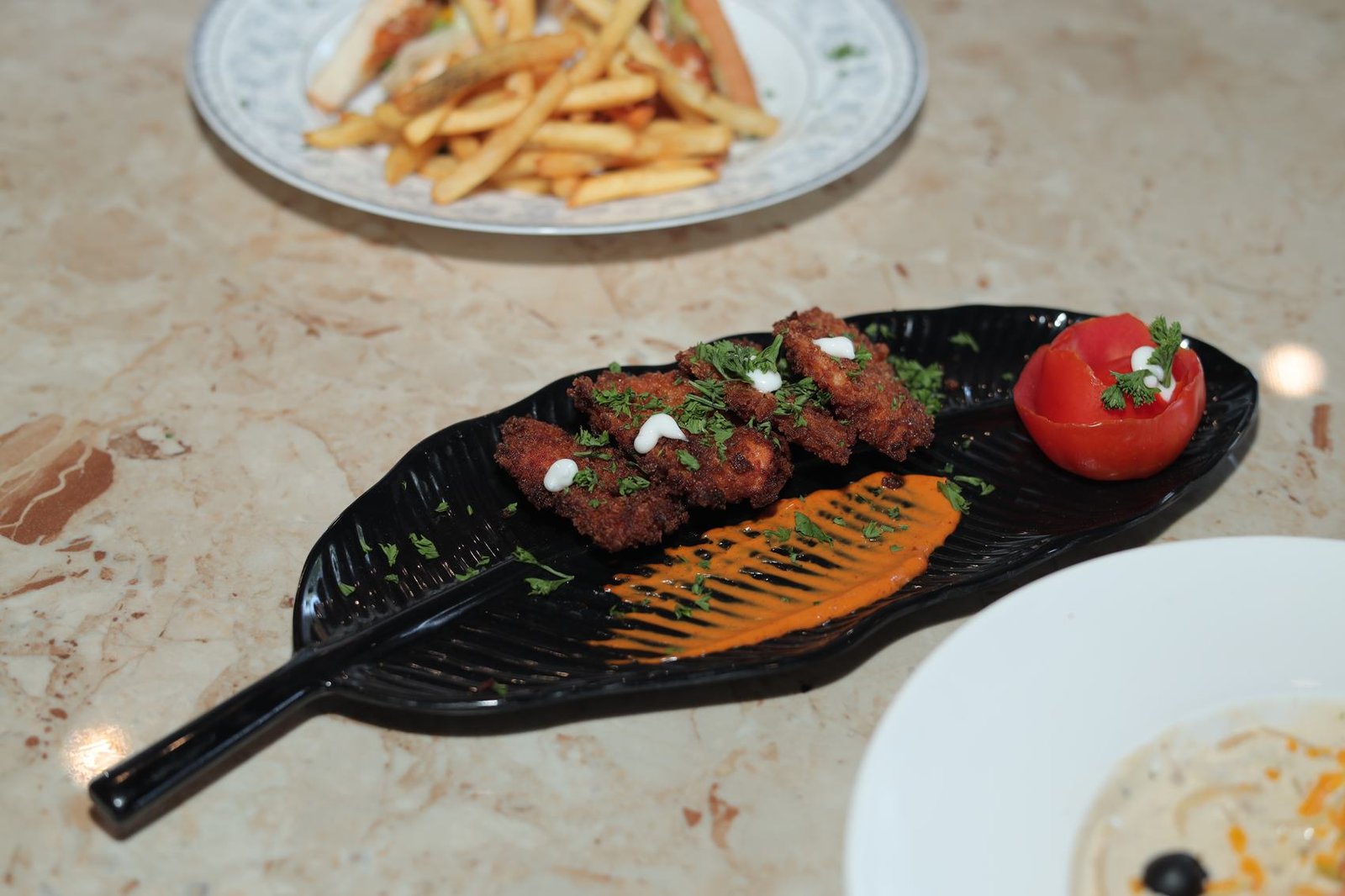 Fried starter on a leaf platter