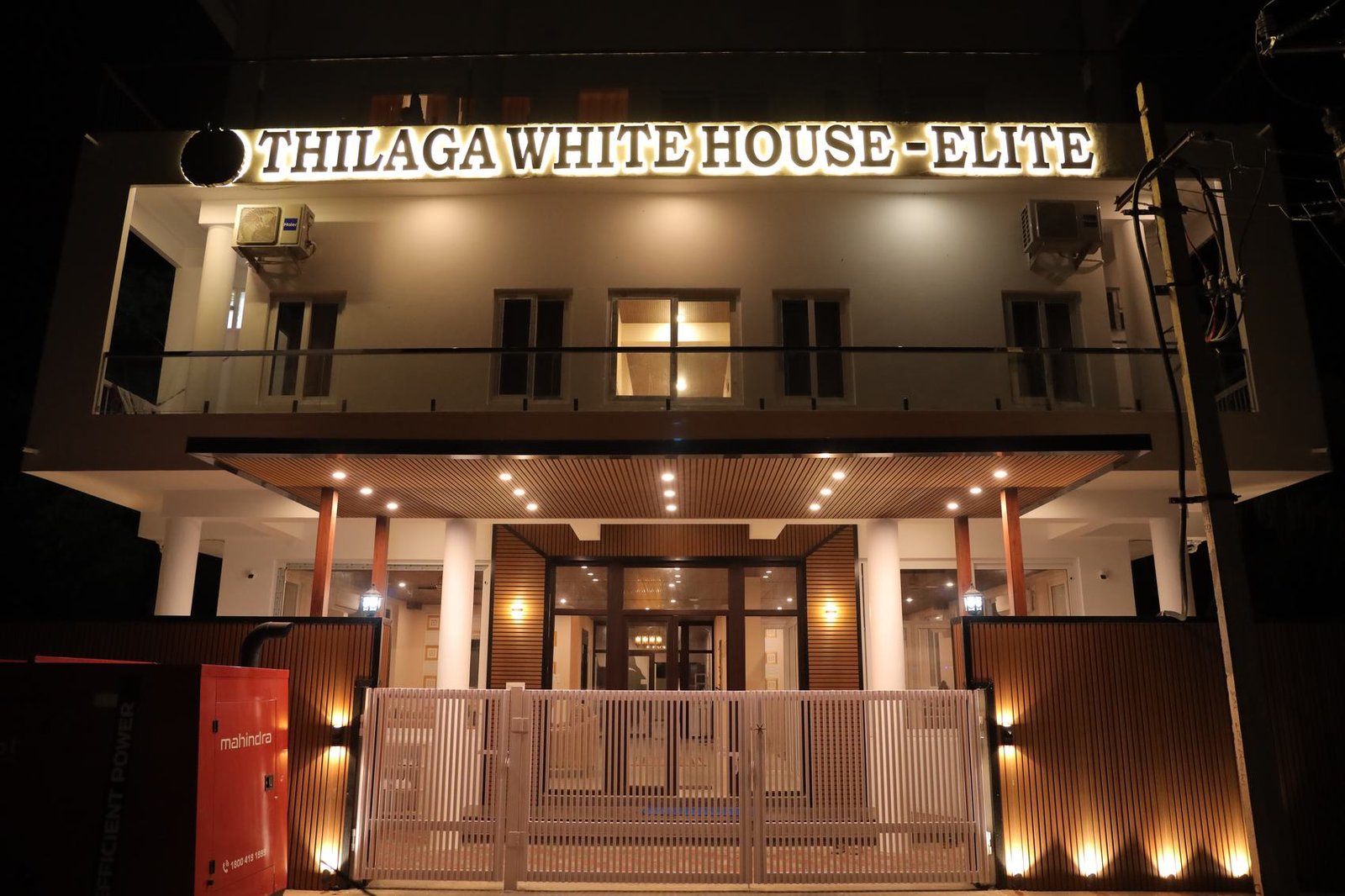 Thilaga White House Elite lit at night